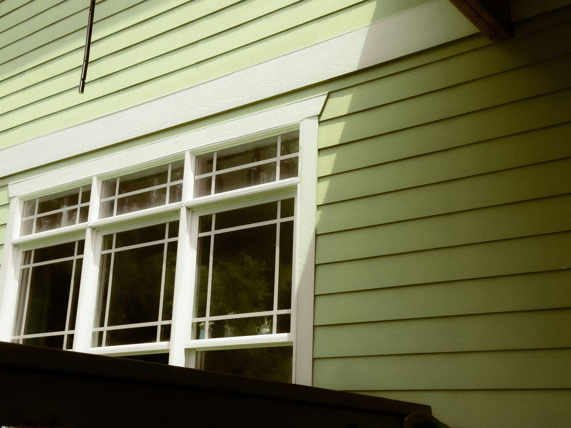 Window and siding of a green house